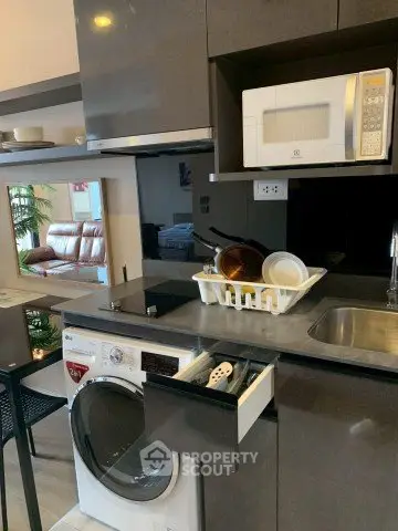 Modern kitchen with integrated appliances and sleek cabinetry