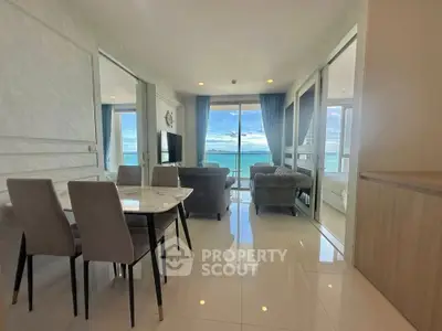 Luxurious beachfront condo with stunning ocean views and modern interior design