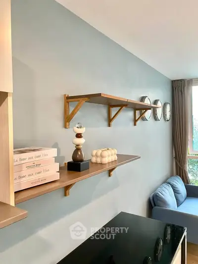Stylish living room with modern shelving and cozy seating area