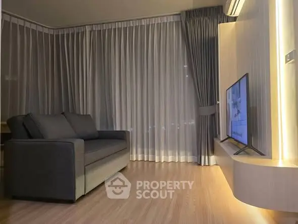 Modern living room with sleek design and ambient lighting