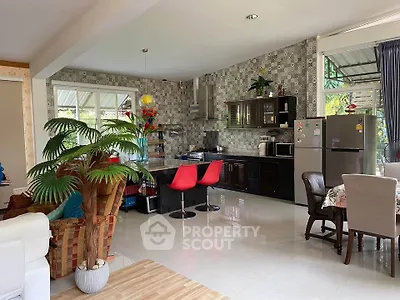 Spacious modern kitchen with open layout and stylish decor