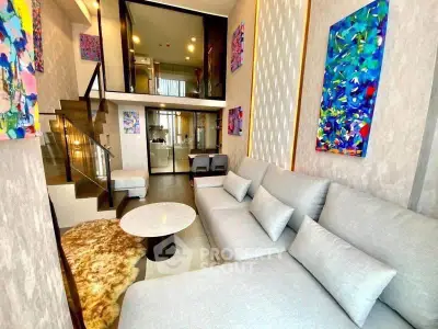 Luxurious modern living room with high ceilings and vibrant artwork