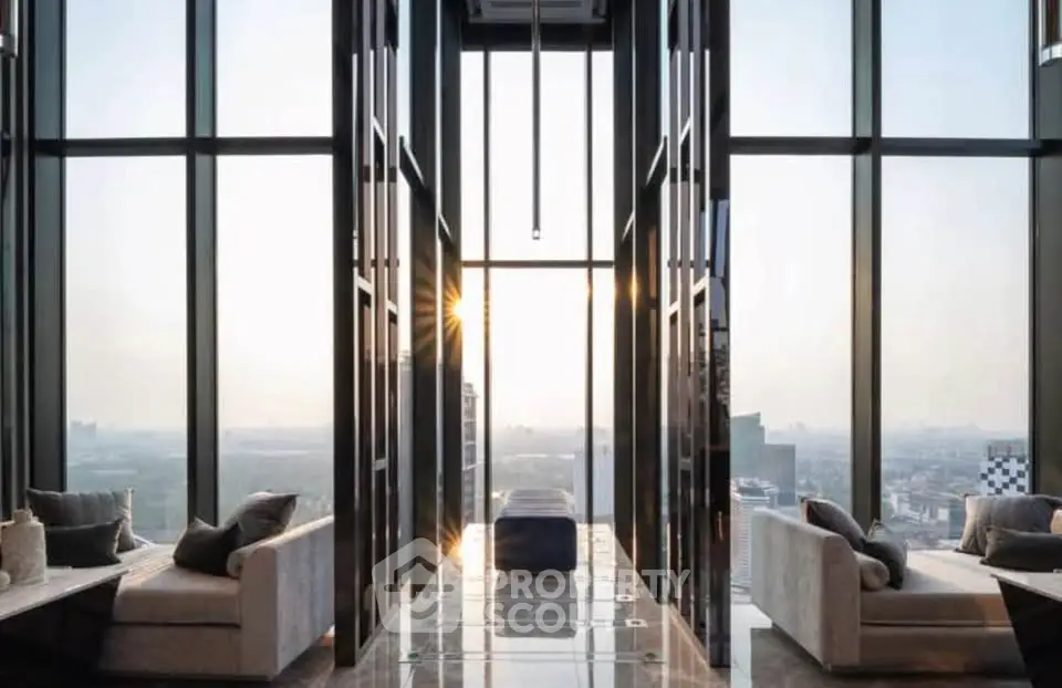 Luxurious high-rise living room with panoramic city views and elegant modern design.