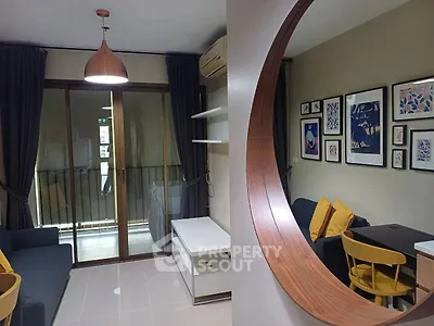 Modern living room with stylish decor and balcony access