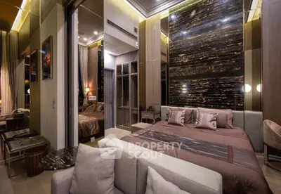 Luxurious modern bedroom with elegant decor and plush furnishings in a high-end apartment.