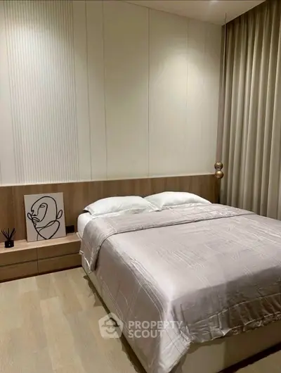 Modern bedroom with minimalist decor and cozy ambiance