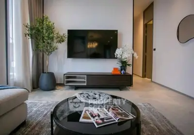 Modern living room with sleek TV setup and stylish decor