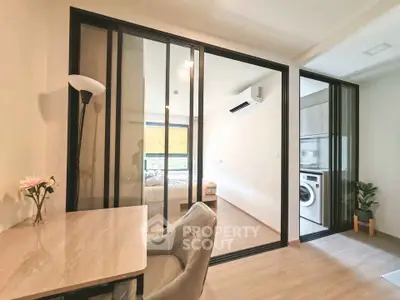 Modern apartment interior with study area and bedroom view