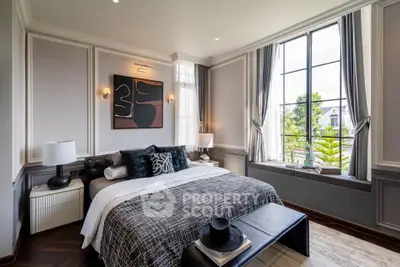 Luxurious bedroom with elegant decor and large window view