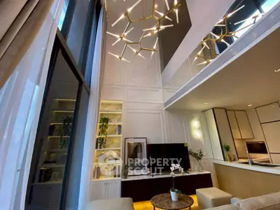 Luxurious modern living room with high ceilings and elegant lighting