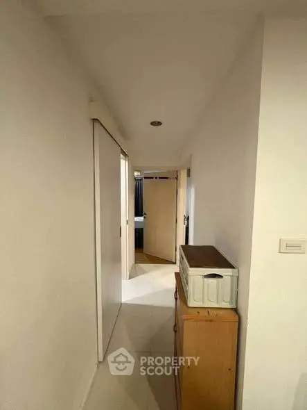 Bright hallway with modern decor and sleek storage solutions