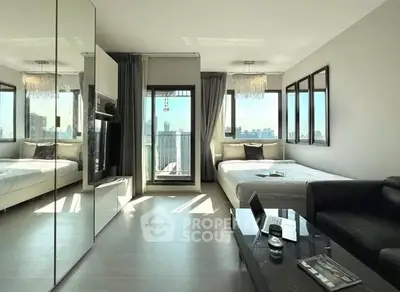 Modern bedroom with city view, mirrored closet, and sleek furnishings