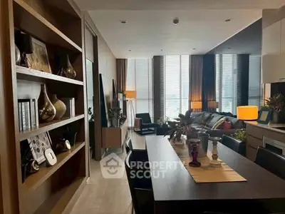 Modern living room with elegant dining area and stylish decor, featuring floor-to-ceiling windows and contemporary furniture.