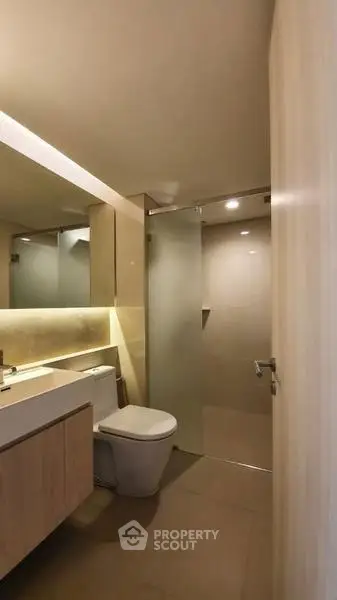Modern bathroom with sleek design and glass shower enclosure