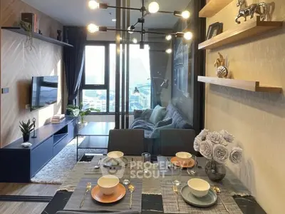 Modern living and dining area with stylish decor and city view