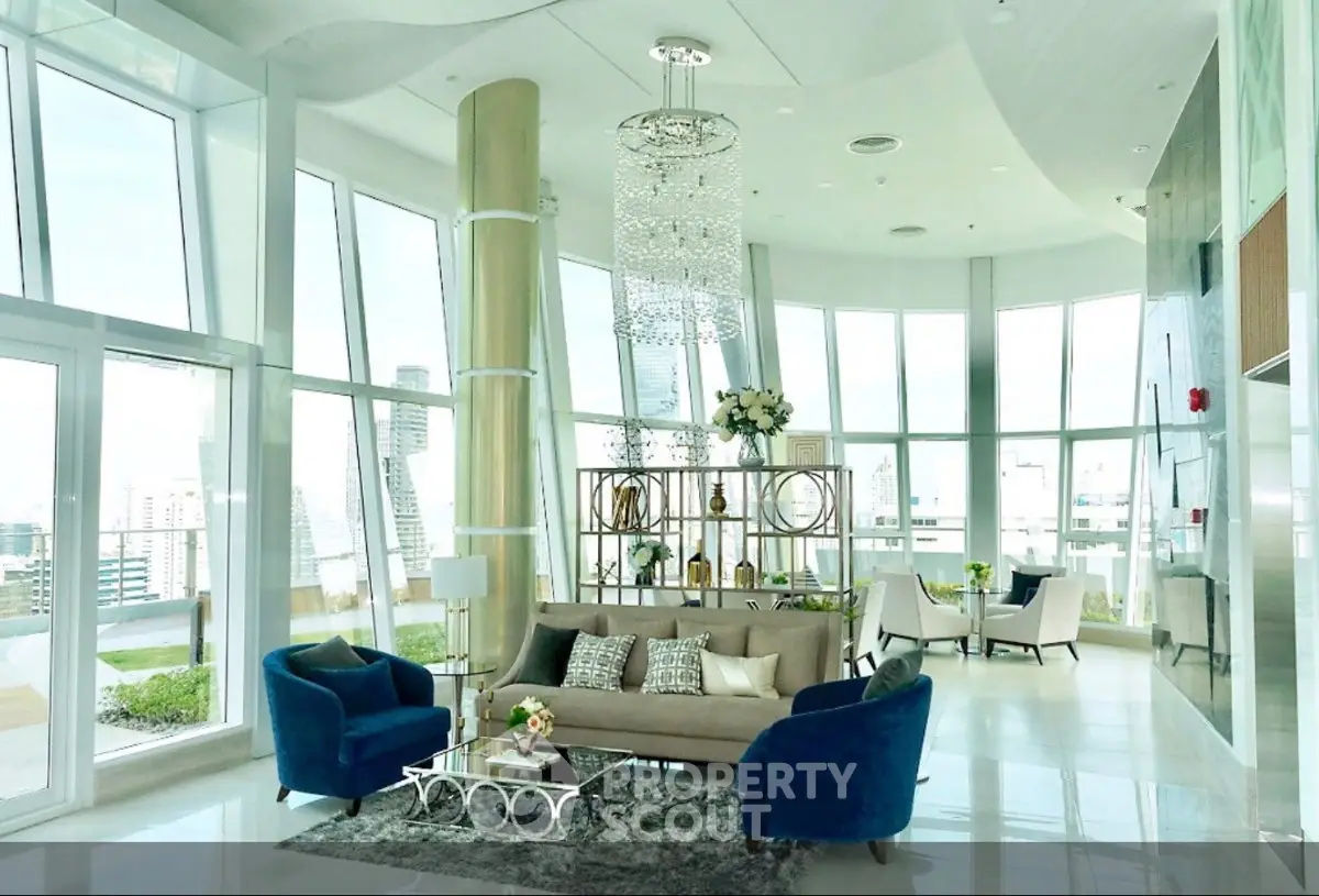 Luxurious penthouse living room with panoramic city views and elegant modern decor.