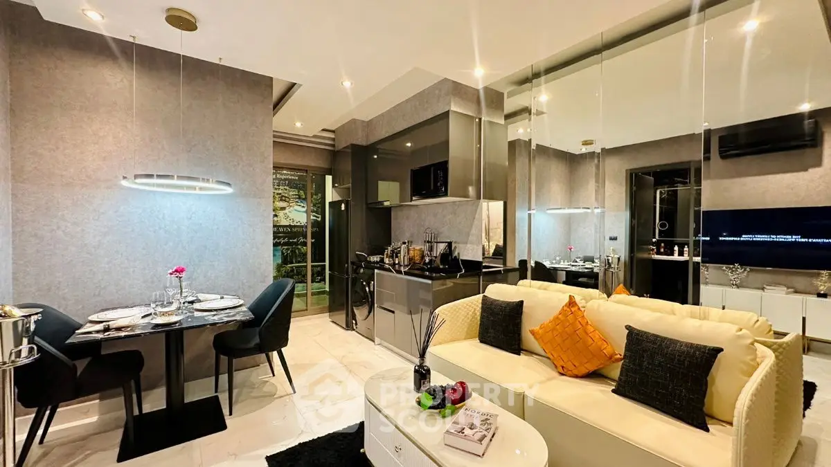 Modern open-plan living room with stylish kitchen and dining area
