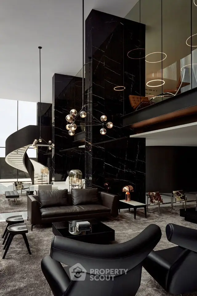 Luxurious modern living room with high ceilings, elegant black marble walls, and stylish contemporary furniture.