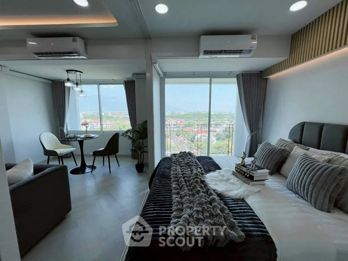 Luxurious modern bedroom with stunning city view and elegant decor