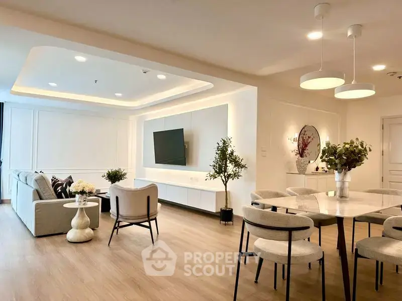 Spacious modern living room with elegant dining area and stylish decor