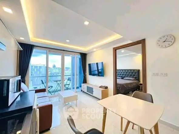 Modern open-plan living room with balcony view and stylish decor