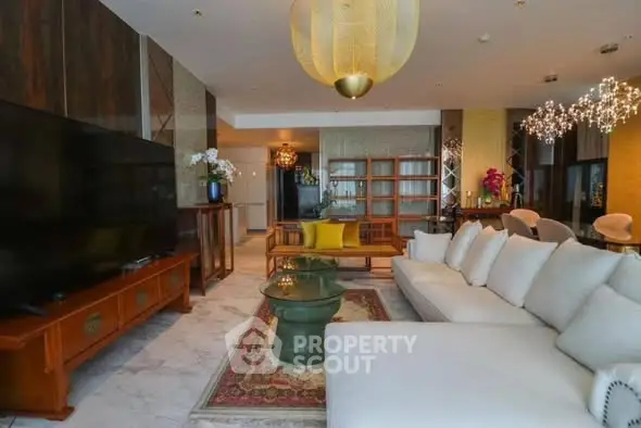 Luxurious living room with elegant decor and spacious seating area.