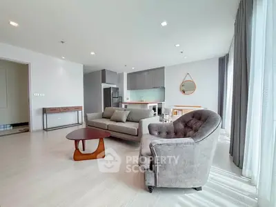 Spacious modern living room with stylish furniture and natural light