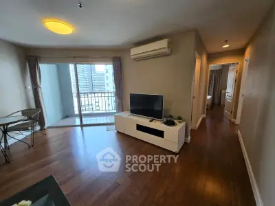 Spacious living room with balcony view in modern apartment