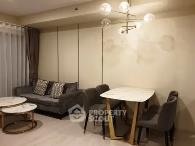 Modern living room with elegant furniture and stylish lighting