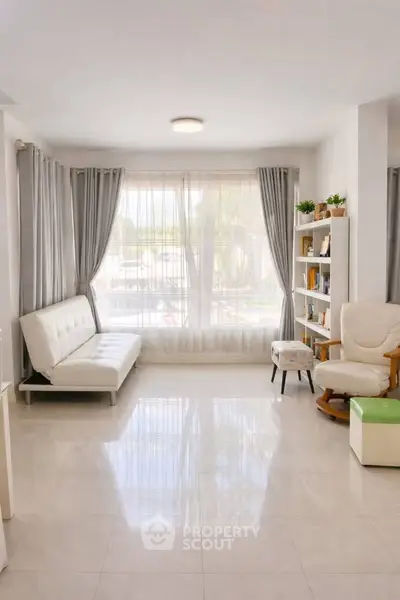 Bright and airy living room with modern furniture and large windows