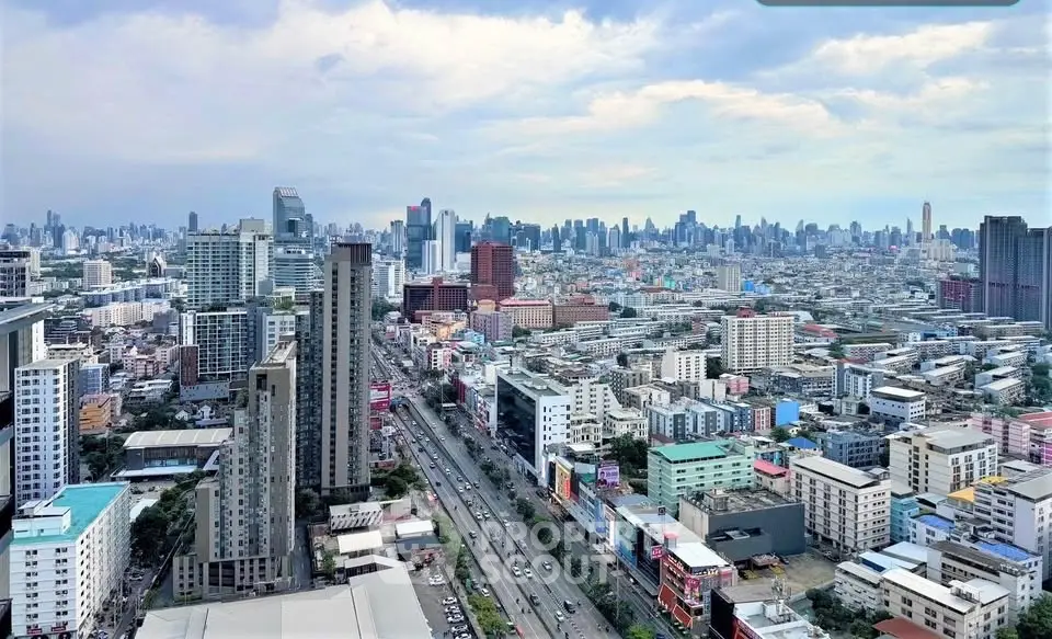 Stunning aerial view of a bustling cityscape with skyscrapers and vibrant urban life.