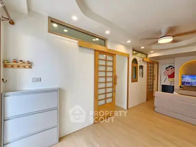 Modern living room with sliding doors and cozy decor