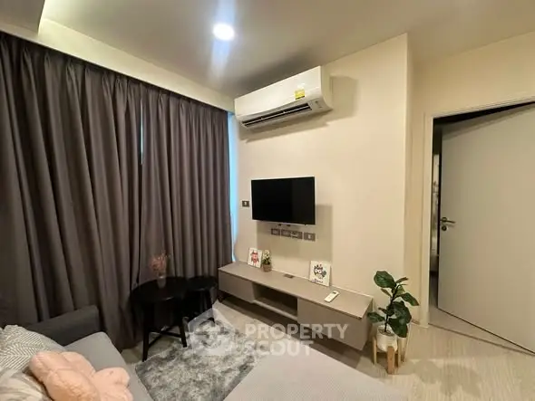 Modern living room with air conditioning and stylish decor