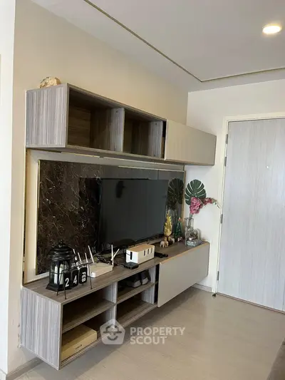 Modern living room with stylish TV unit and elegant decor