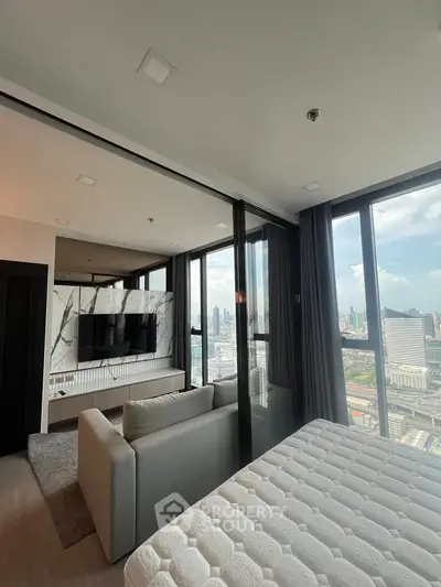 Luxurious corner unit with panoramic city views, featuring a spacious living area and modern design.