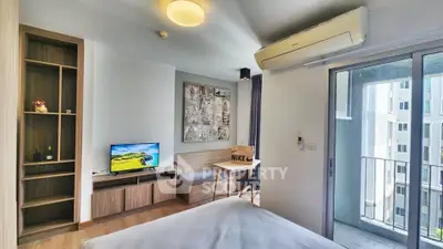 Modern studio apartment with balcony and stylish decor