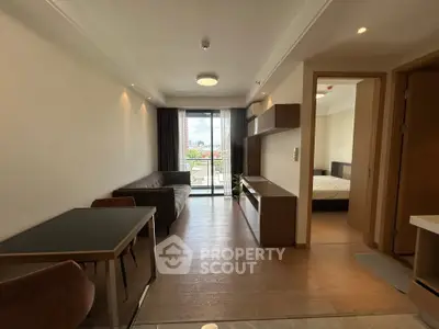 Modern living room with balcony view in stylish apartment