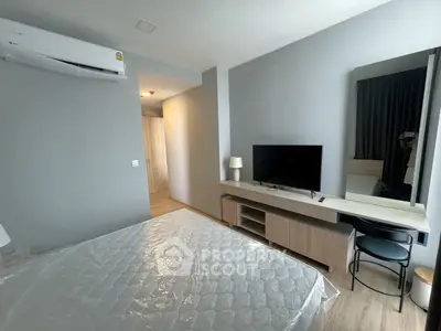 Modern bedroom with air conditioning and sleek furniture