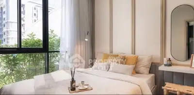 Cozy bedroom with large window and elegant decor in modern apartment