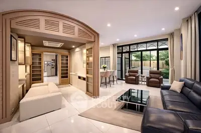 Luxurious modern living room with elegant furniture and garden view, perfect for stylish living.
