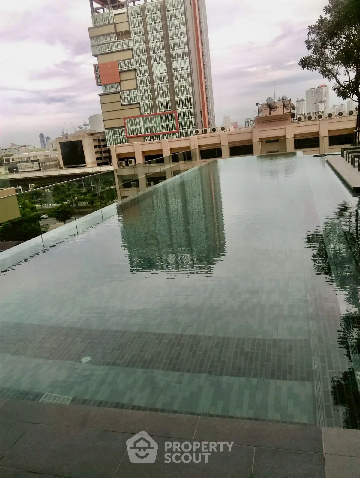 Luxurious rooftop infinity pool with stunning cityscape views