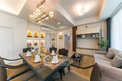 Luxurious living room with elegant dining setup and modern decor