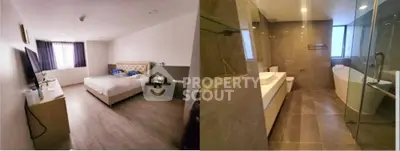 Spacious bedroom with modern decor and luxurious bathroom featuring a bathtub and glass shower.