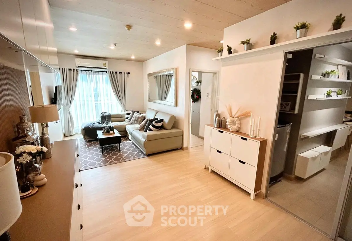 Spacious modern living room with elegant decor and natural light