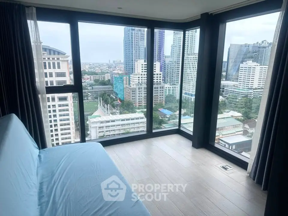 Stunning corner unit with panoramic city views and floor-to-ceiling windows.