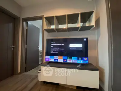 Modern living room with smart TV and stylish shelving unit