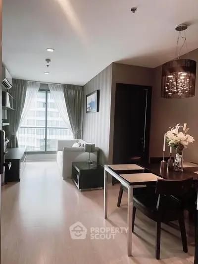 Modern living room with elegant dining area and large window view