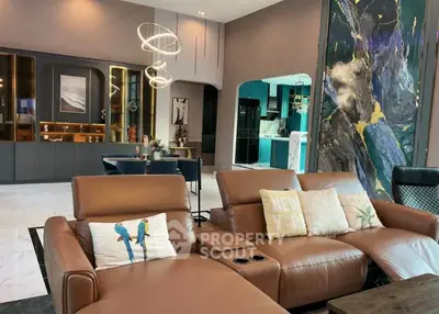 Luxurious modern living room with leather sofas and stylish lighting