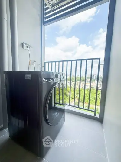 Modern balcony with washing machine and scenic city view, perfect for urban living convenience.