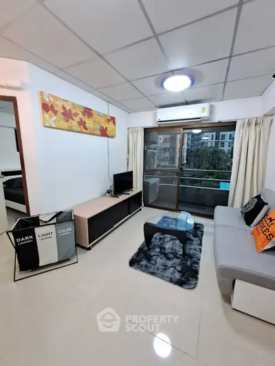 Modern living room with balcony view in urban apartment